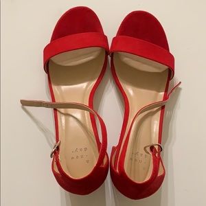 Bright red straps block heels